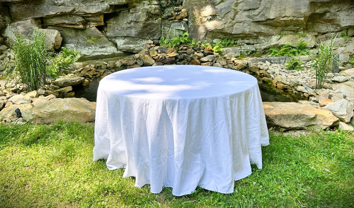 our round table - shown with optional white linen
